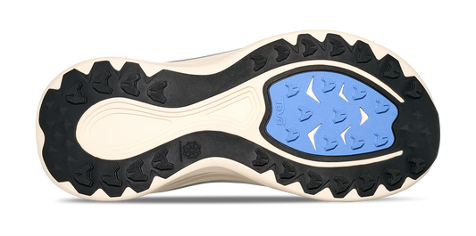 Bottom view of sandal sole from women's off white Teva Aventrail R2T with black and light blue trail rubber