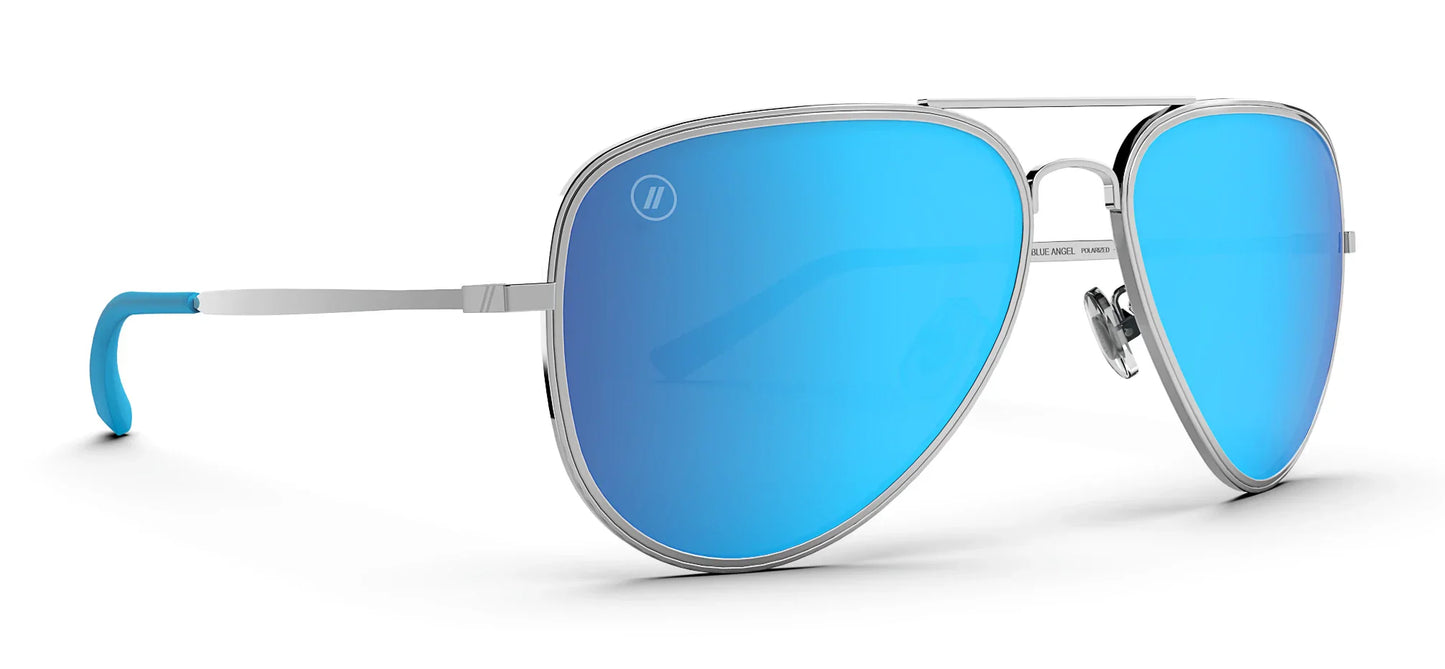 Aviator style Blenders sunglasses with blue lenses and silver frame on a white background