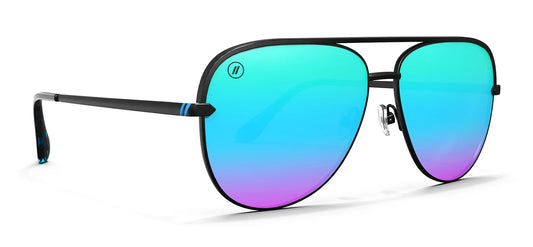 Blenders Sunglasses with a gradient blue to purple lens and a black frame on a white background