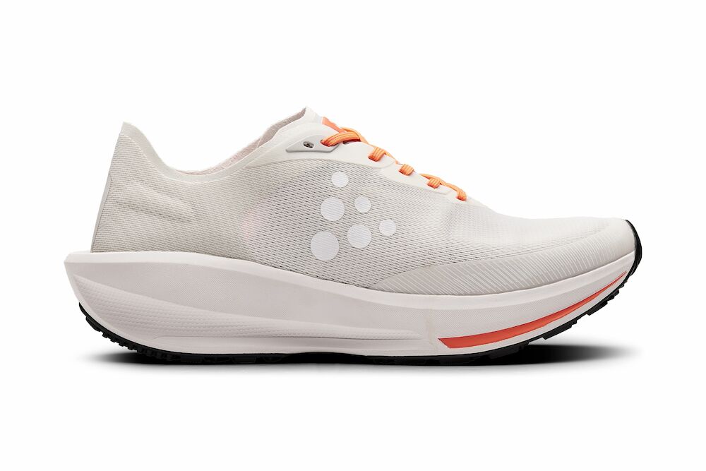 White Craft brand running shoe with orange accents on a white background