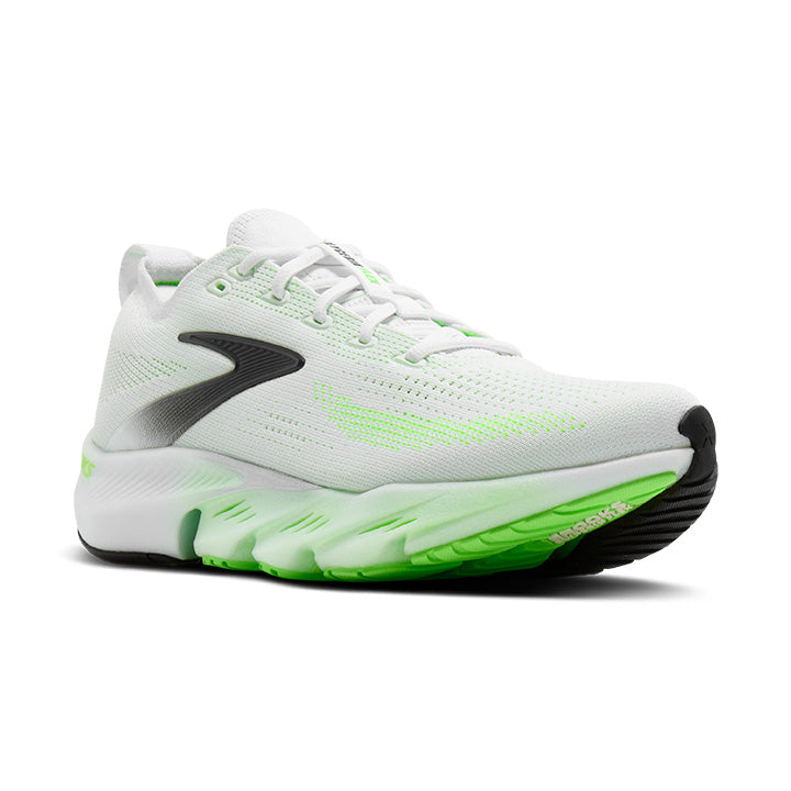 White running shoe with green and white sole and black detailing on a white background