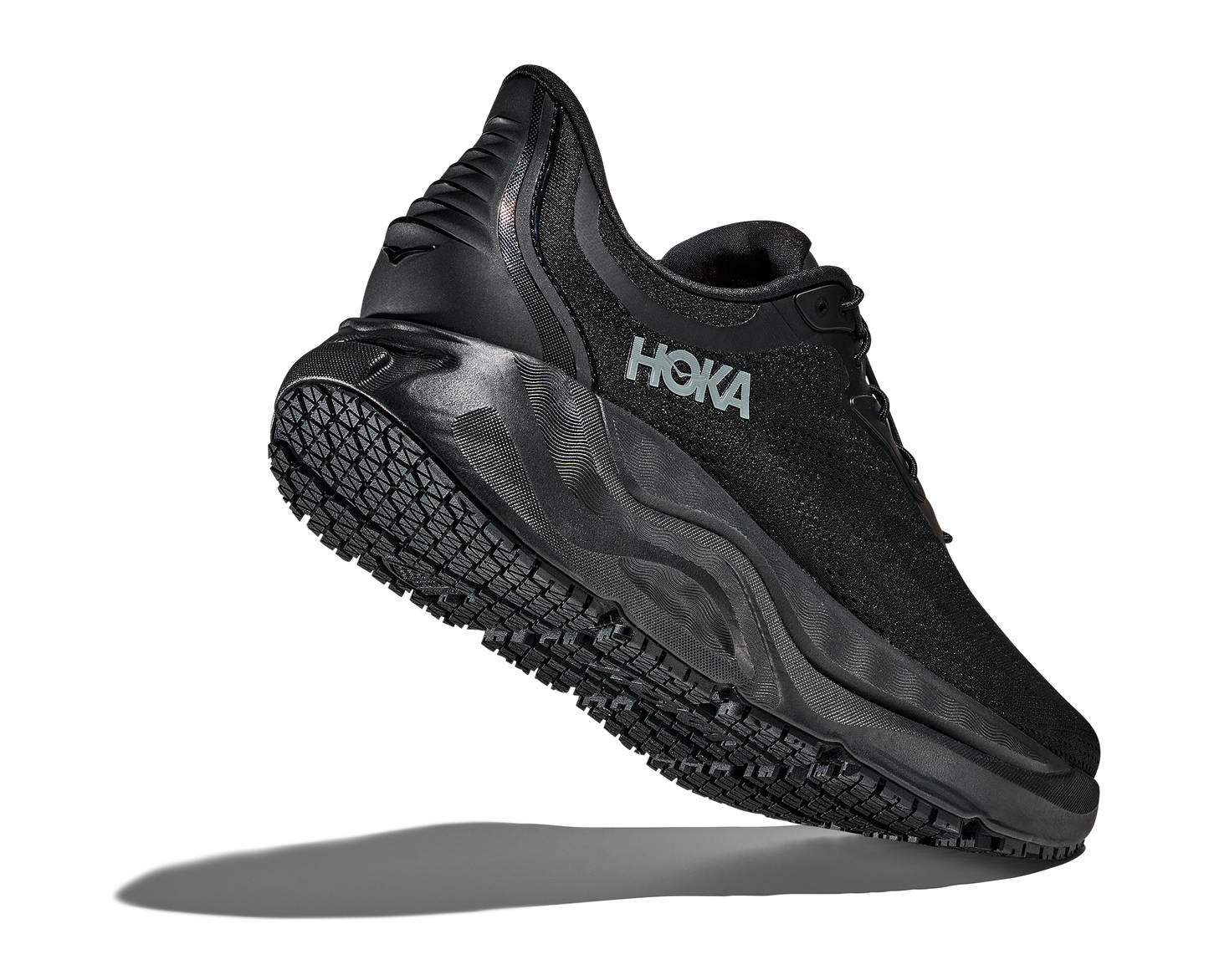 Black Hoka running shoe on a white background