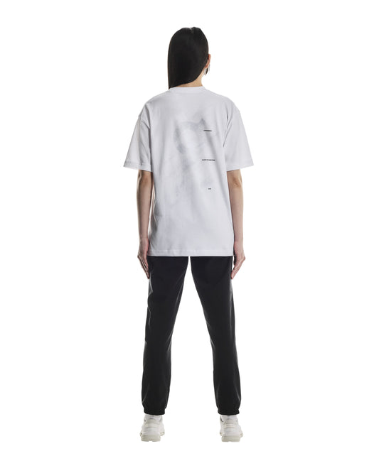 Rear side of Person wearing a white t-shirt and black pants on a white background