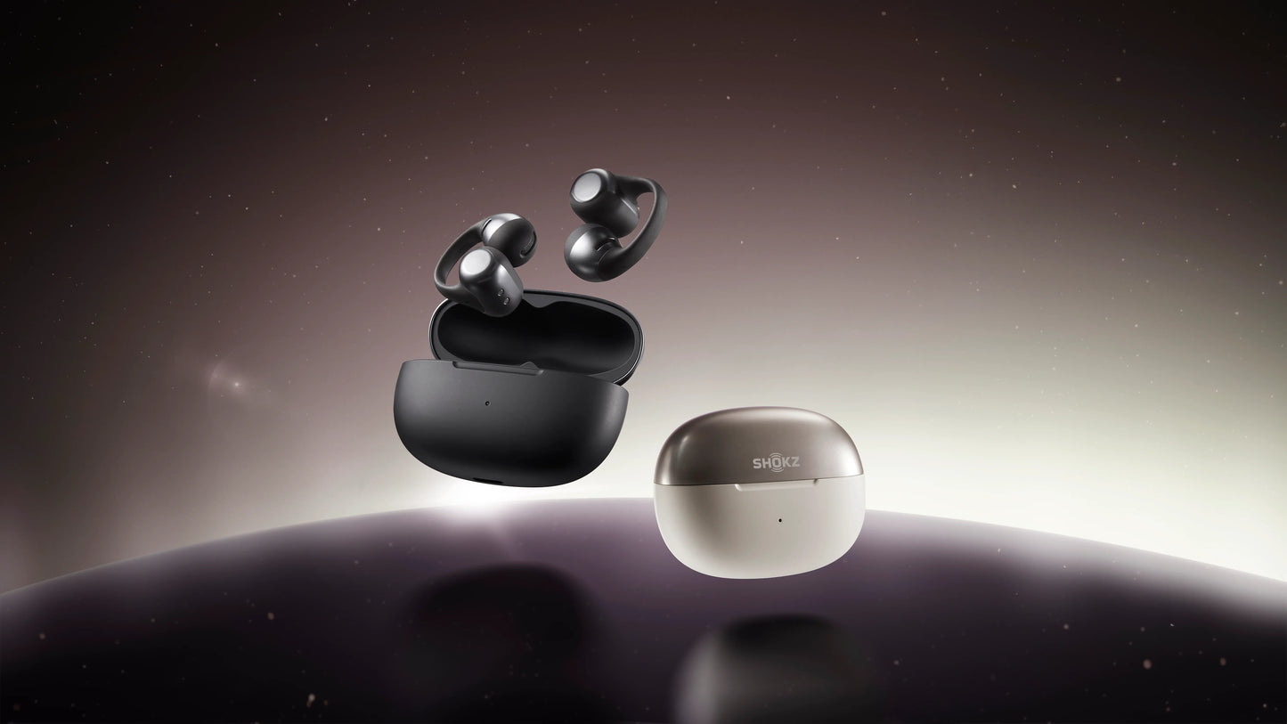 Wireless earbuds with charging case against a space-themed background